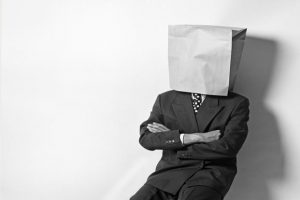 Man with paper bag on head Denial Metaphor